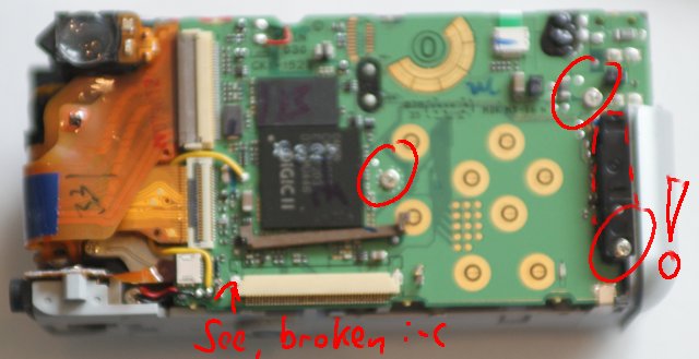 [Image of the exposed main circuit board]